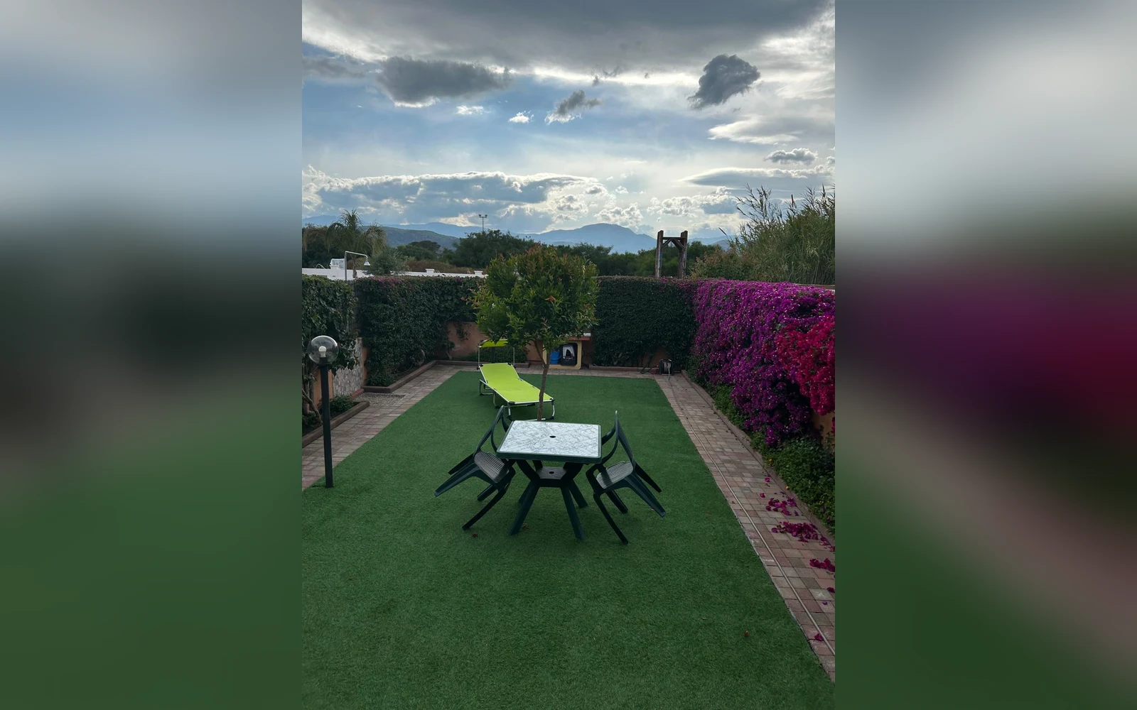 Giardino della Villetta Laura con tavolo all'aperto — Case Vacanze Arbatax, Arbatax (Sardegna) (foto 56)